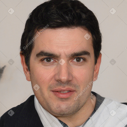 Joyful white young-adult male with short  black hair and brown eyes