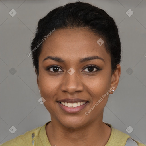 Joyful black young-adult female with short  black hair and brown eyes