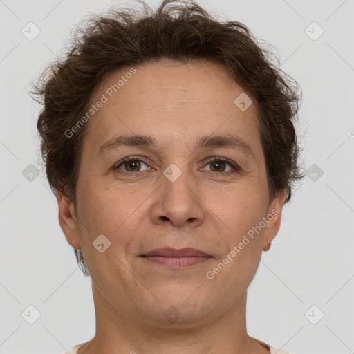 Joyful white adult female with short  brown hair and brown eyes