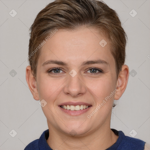 Joyful white young-adult female with short  brown hair and grey eyes