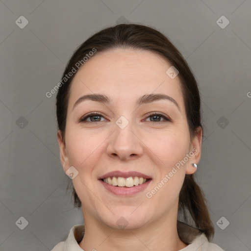 Joyful white young-adult female with medium  brown hair and brown eyes