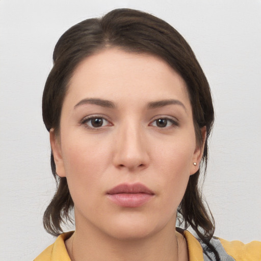 Neutral white young-adult female with medium  brown hair and brown eyes