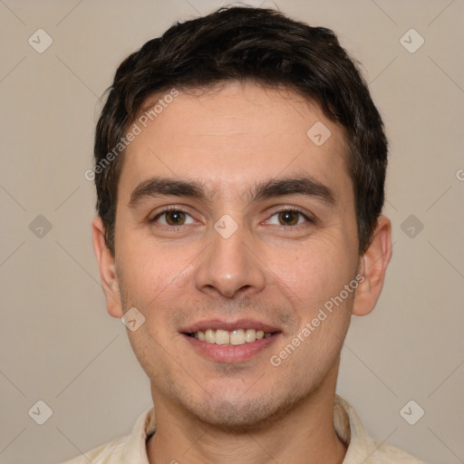 Joyful white young-adult male with short  brown hair and brown eyes