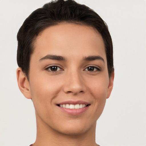 Joyful white young-adult female with short  brown hair and brown eyes