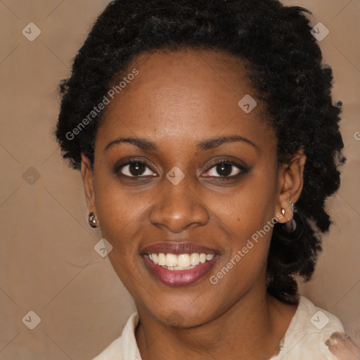 Joyful black young-adult female with medium  black hair and brown eyes