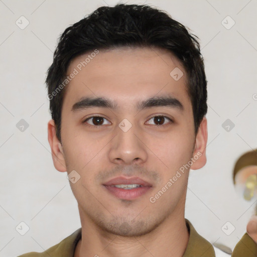 Joyful white young-adult male with short  black hair and brown eyes