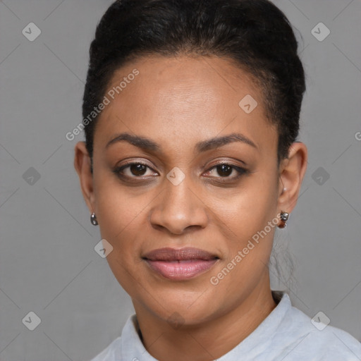 Joyful black young-adult female with short  black hair and brown eyes