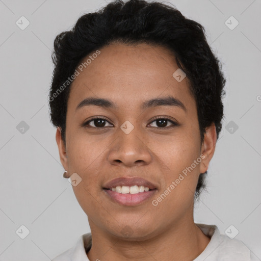 Joyful latino young-adult female with short  black hair and brown eyes