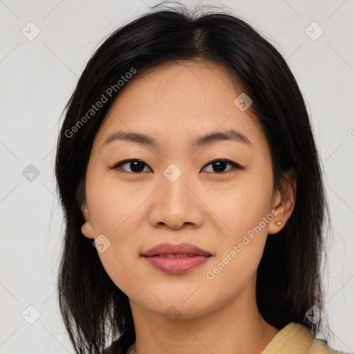 Joyful asian young-adult female with medium  brown hair and brown eyes