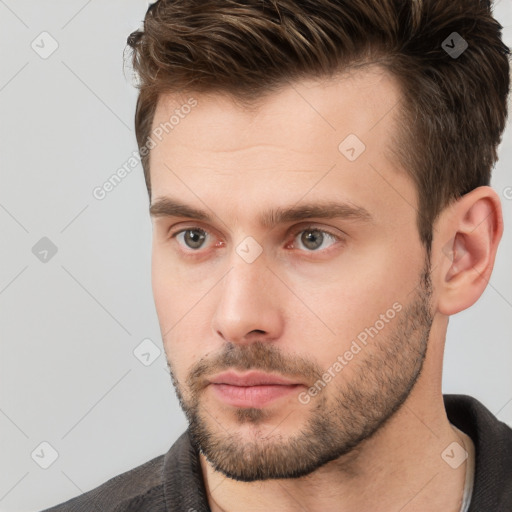 Neutral white young-adult male with short  brown hair and brown eyes