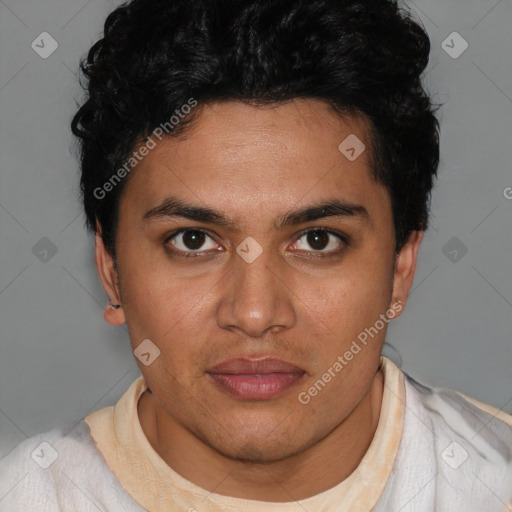 Joyful latino young-adult male with short  brown hair and brown eyes