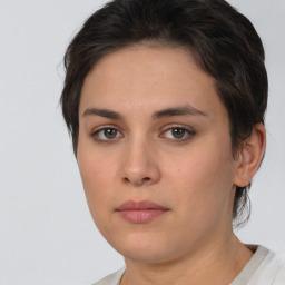 Neutral white young-adult female with short  brown hair and brown eyes