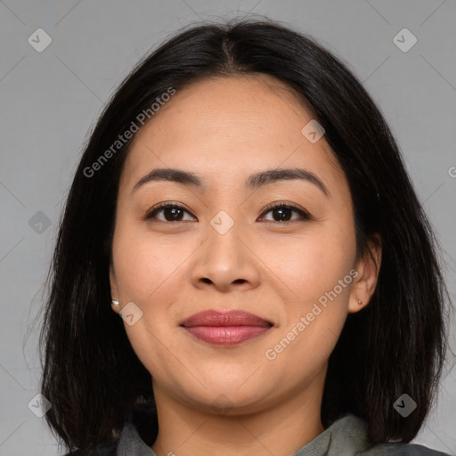 Joyful asian young-adult female with medium  brown hair and brown eyes