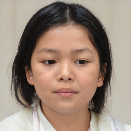 Neutral asian child female with medium  brown hair and brown eyes