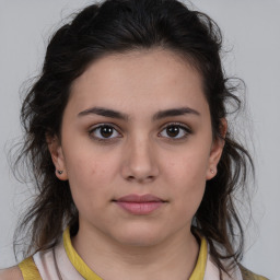 Neutral white young-adult female with medium  brown hair and brown eyes