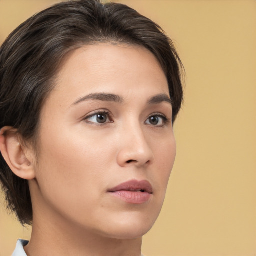 Neutral white young-adult female with medium  brown hair and brown eyes