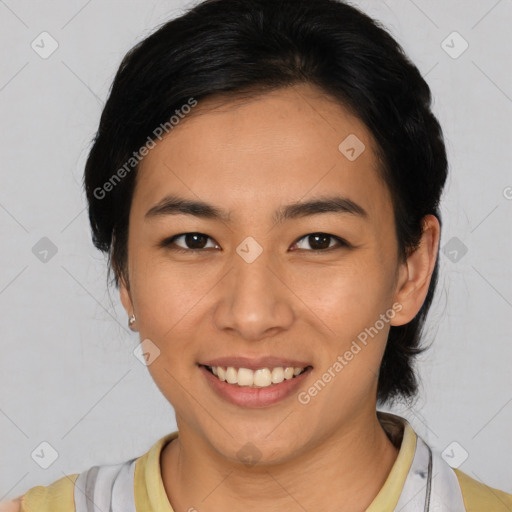 Joyful asian young-adult female with medium  black hair and brown eyes