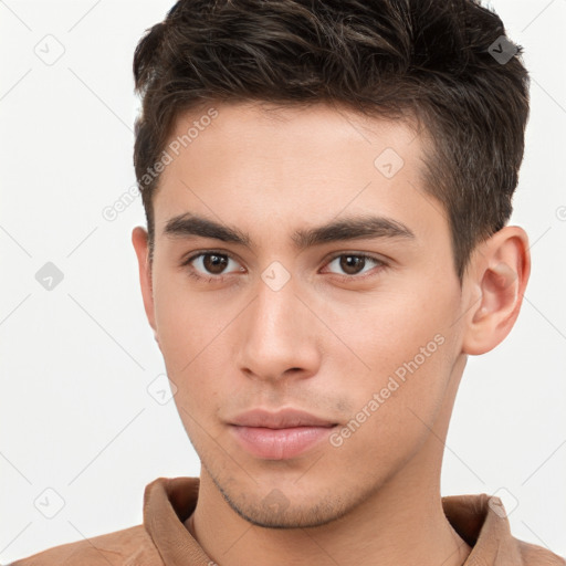 Neutral white young-adult male with short  brown hair and brown eyes