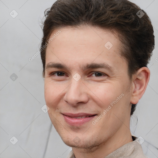 Joyful white young-adult male with short  brown hair and brown eyes