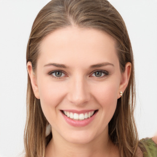 Joyful white young-adult female with long  brown hair and grey eyes