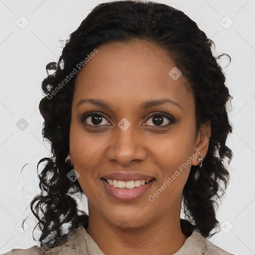 Joyful black young-adult female with medium  brown hair and brown eyes