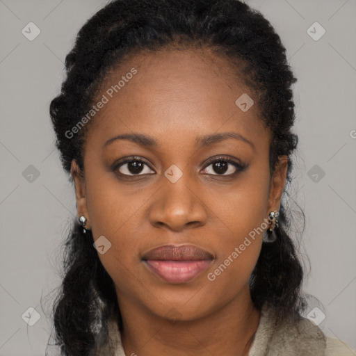 Joyful black young-adult female with long  black hair and brown eyes