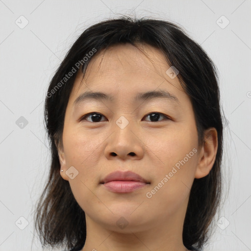 Joyful asian young-adult female with medium  brown hair and brown eyes