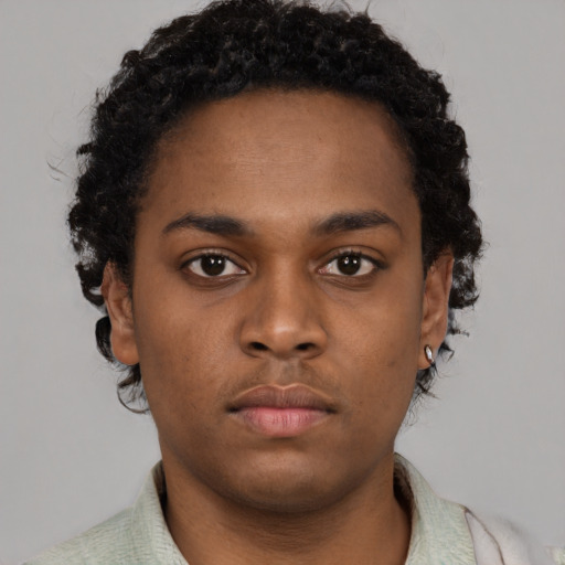 Neutral black young-adult male with short  brown hair and brown eyes