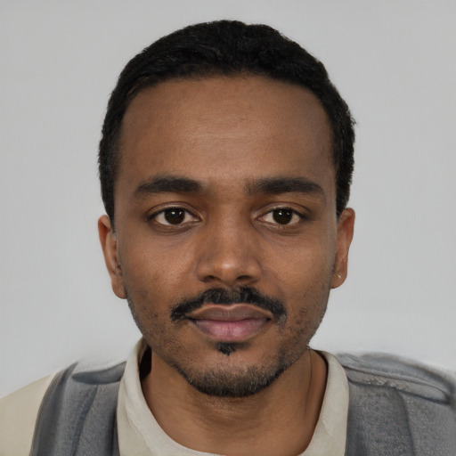 Neutral black young-adult male with short  black hair and brown eyes