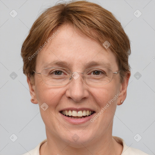 Joyful white adult female with short  brown hair and grey eyes