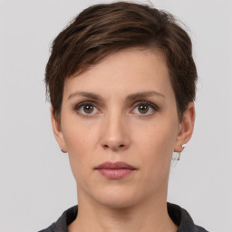 Neutral white young-adult female with short  brown hair and brown eyes