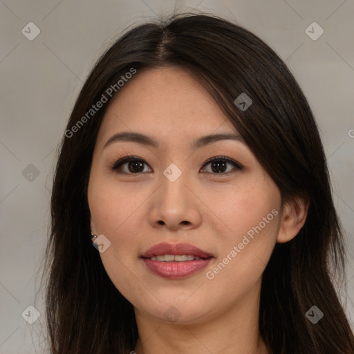 Joyful asian young-adult female with long  brown hair and brown eyes