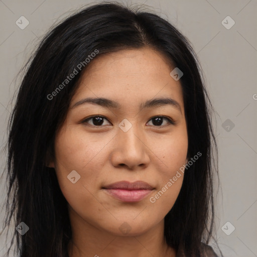 Joyful latino young-adult female with long  brown hair and brown eyes