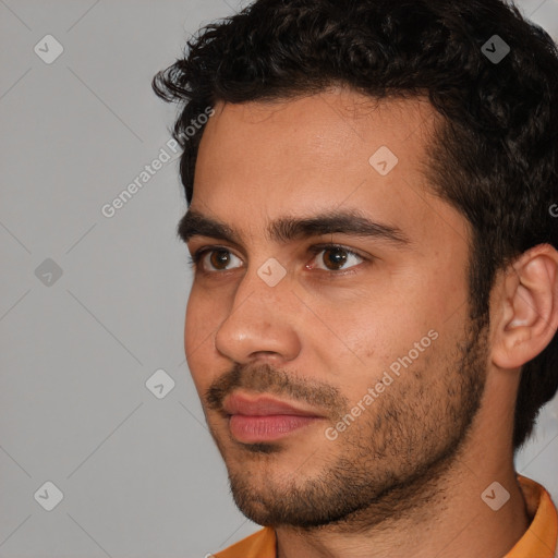 Neutral white young-adult male with short  black hair and brown eyes