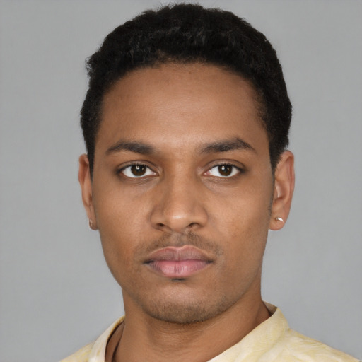 Neutral latino young-adult male with short  black hair and brown eyes