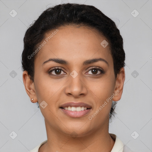 Joyful latino young-adult female with short  brown hair and brown eyes