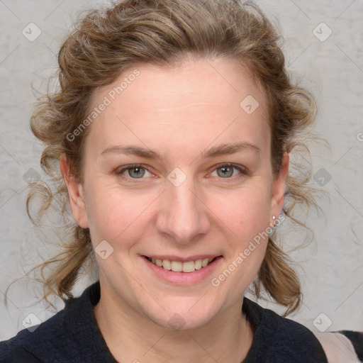 Joyful white young-adult female with medium  brown hair and blue eyes