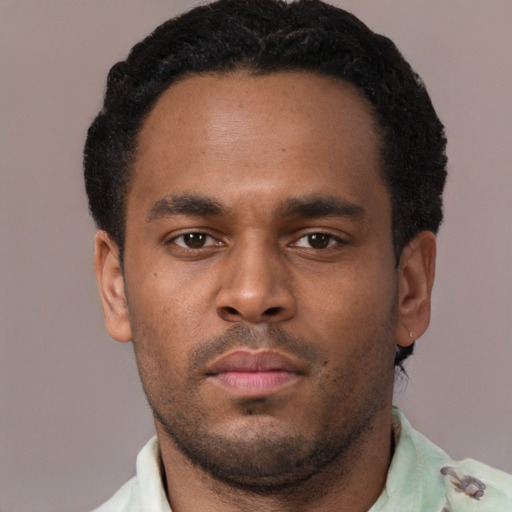 Neutral black young-adult male with short  black hair and brown eyes