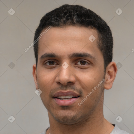 Joyful white young-adult male with short  black hair and brown eyes