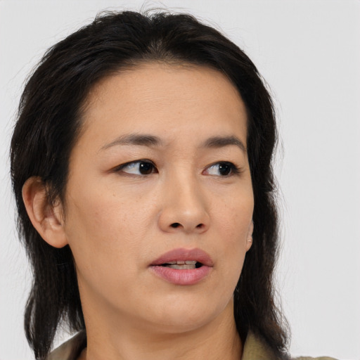 Neutral white adult female with long  brown hair and brown eyes