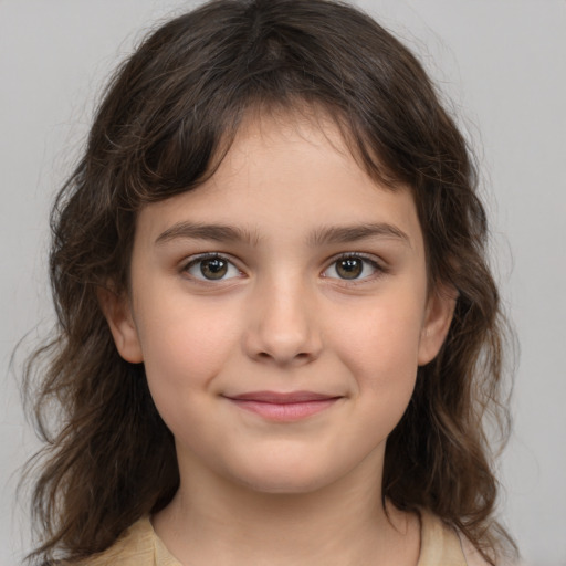 Joyful white child female with medium  brown hair and brown eyes