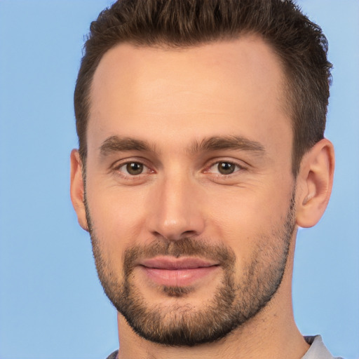 Joyful white young-adult male with short  brown hair and brown eyes