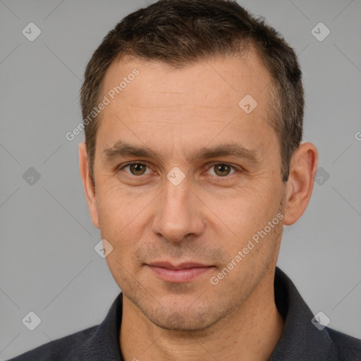 Joyful white adult male with short  brown hair and brown eyes