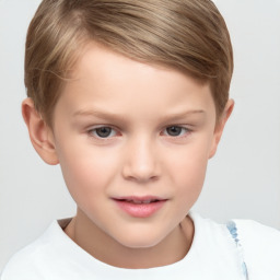 Joyful white child female with short  brown hair and grey eyes