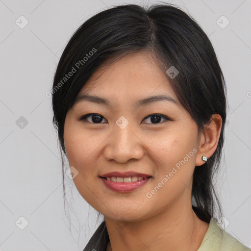 Joyful asian young-adult female with medium  black hair and brown eyes