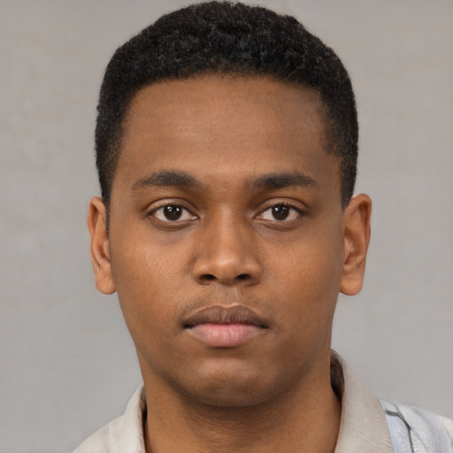 Neutral latino young-adult male with short  brown hair and brown eyes