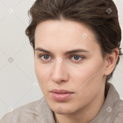 Neutral white young-adult female with short  brown hair and brown eyes