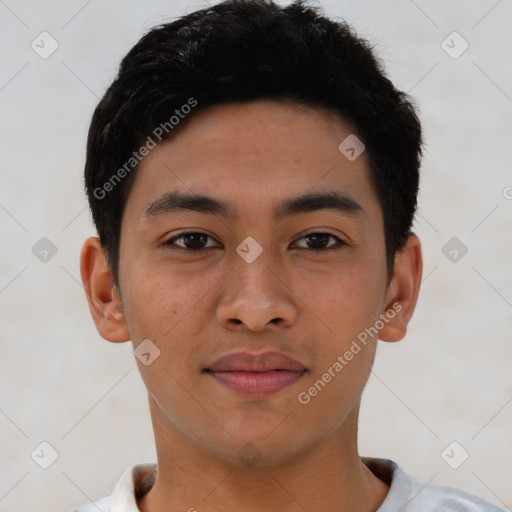 Joyful asian young-adult male with short  brown hair and brown eyes