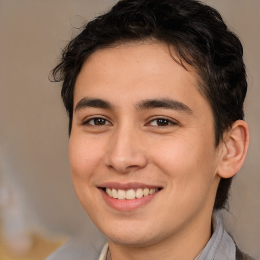 Joyful white young-adult male with medium  brown hair and brown eyes