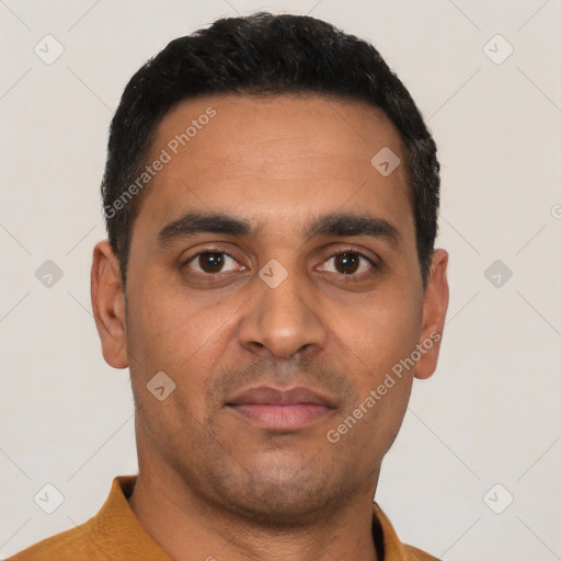 Neutral latino young-adult male with short  black hair and brown eyes